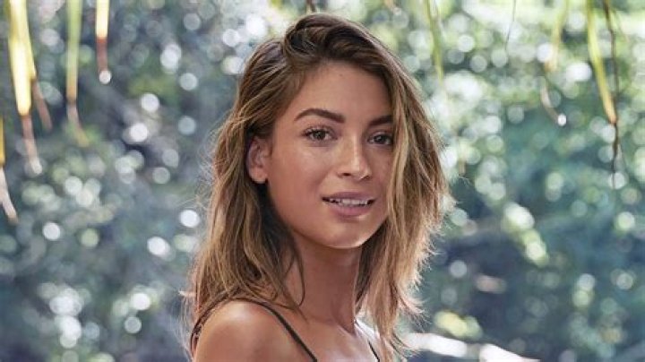 Sam Claflin's Girlfriend Cassie Amato Shares Swimsuit Photo of "Shining Light"